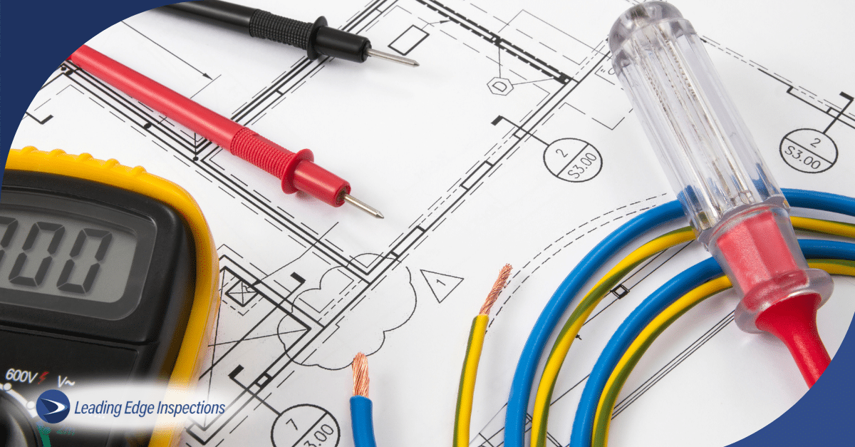 Electrical tools and blueprints used during a home inspection